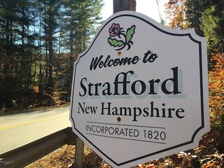 A roadside sign reads Welcome to Strafford, New Hampshire.